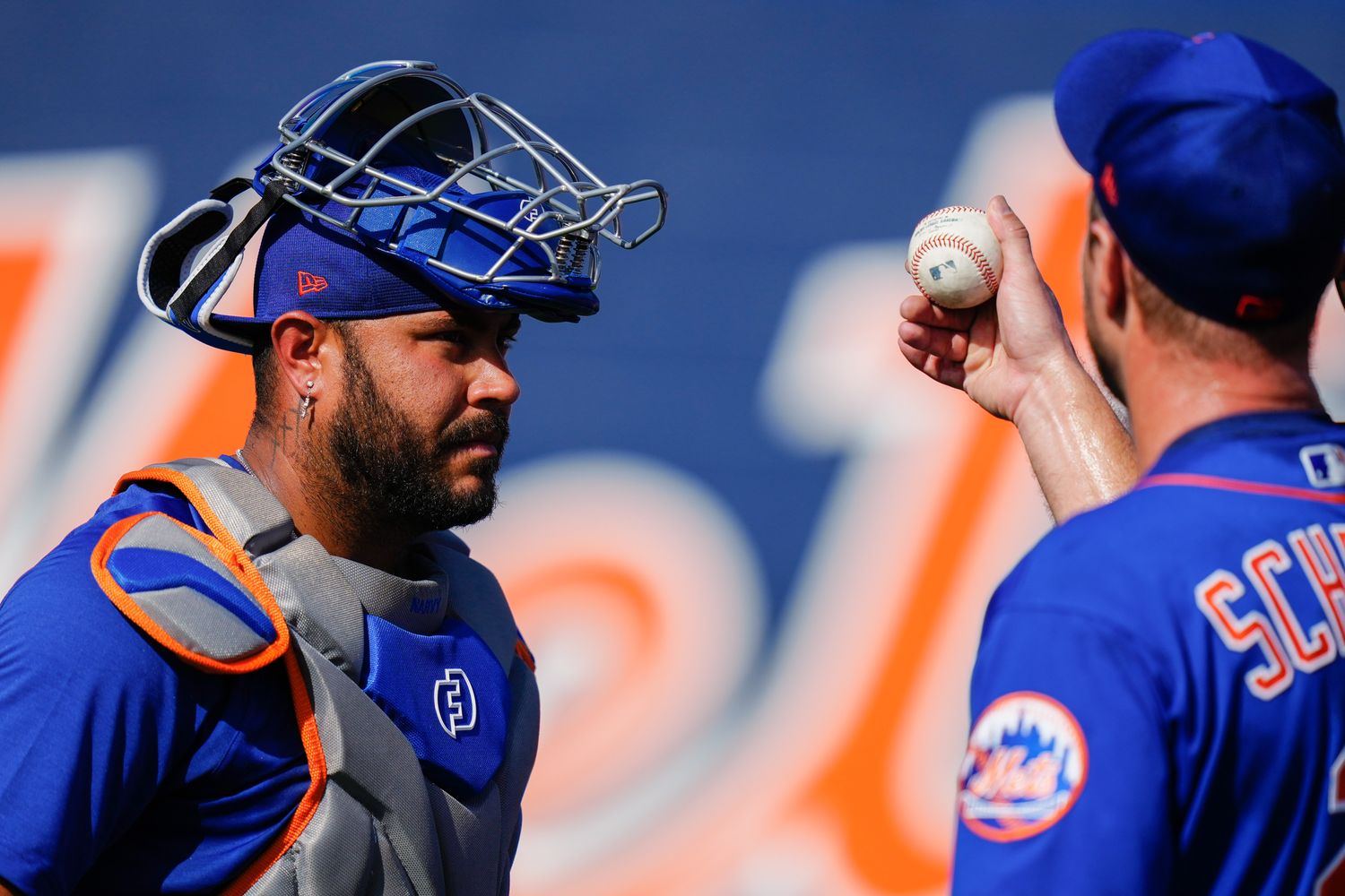 Feb 17, 2023; Port St. Lucie, FL, USA; New York Mets starting pitcher Max Scherzer (21) talks to New York Mets catcher Omar Narvaez (2) during spring training workouts.